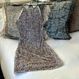 Parker - sequin mini dress with open back.